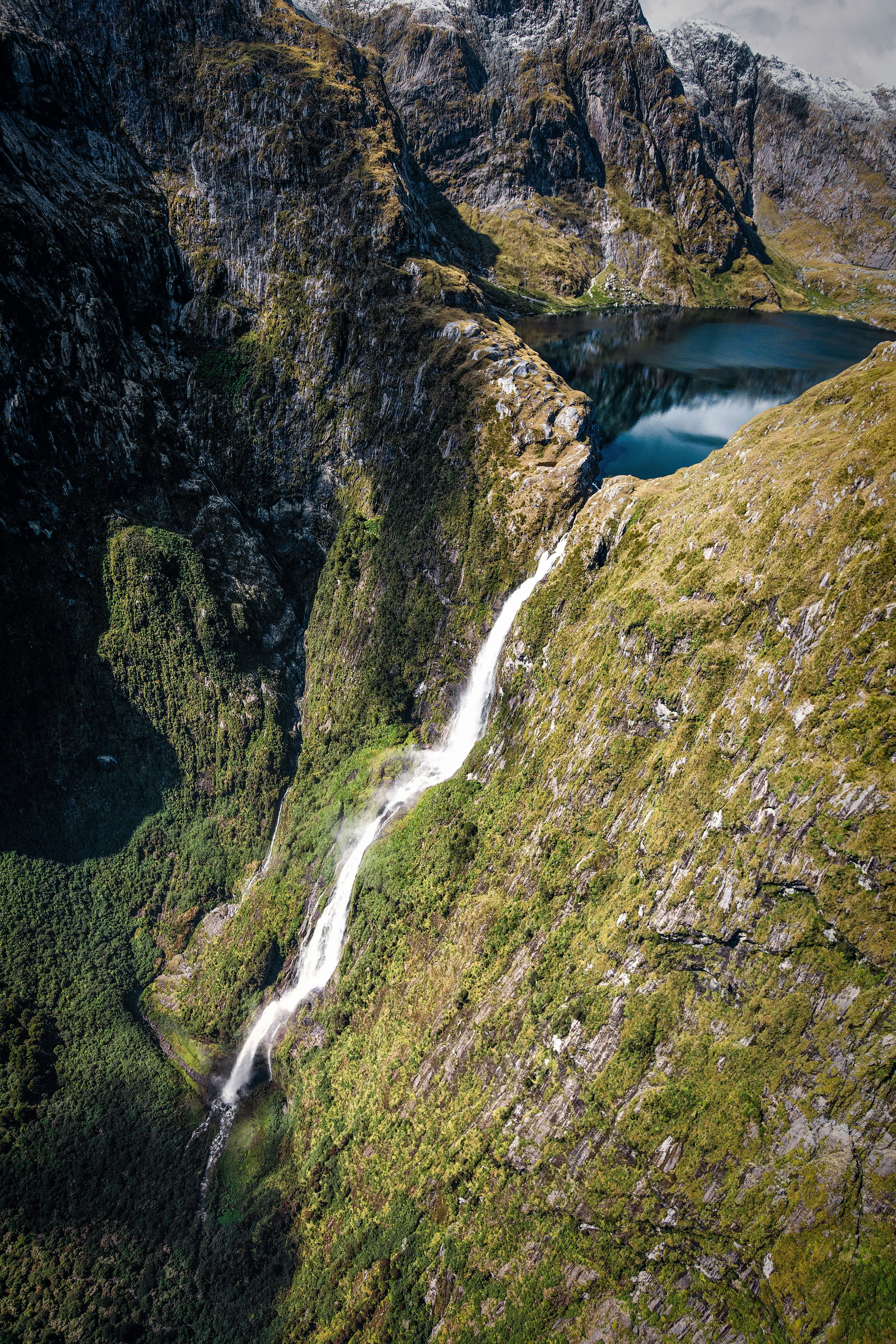 top view of lake with waterfalls